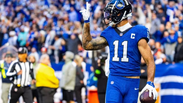 Oct 22, 2023; Indianapolis, Indiana, USA; Indianapolis Colts wide receiver Michael Pittman Jr. (11) celebrates his rushing touchdown in the second half against the Cleveland Browns at Lucas Oil Stadium. Mandatory Credit: Trevor Ruszkowski-USA TODAY Sports